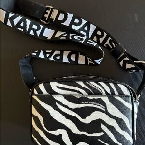 Karl Lagerfeld zebra print bag with guitar style strap